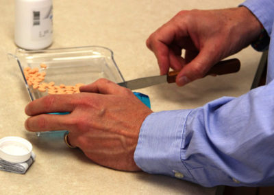pharmacists separating pills